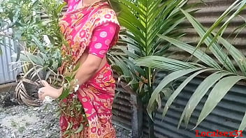 Aunty in red saree enjoys outdoor sex with husband