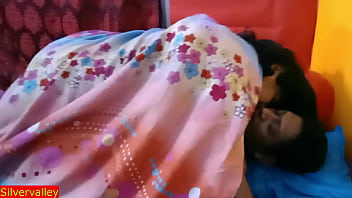 A passionate Indian couple engages in romantic sex under the covers