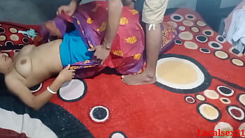 A Bengali wife in a red saree gets fucked by an Indian local in this official video