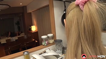 Xnxx video features Japanese homemaker giving oral pleasure in the kitchen